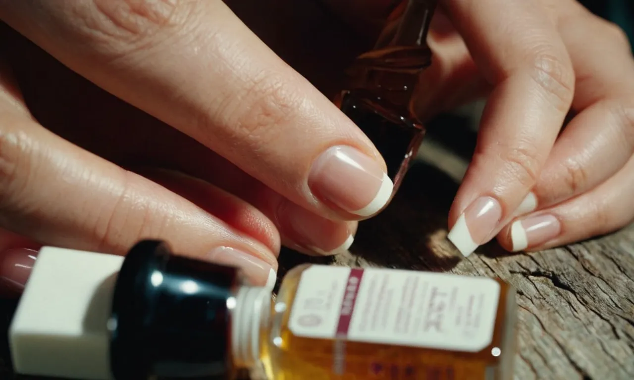 A close-up photograph showcasing a pair of hands gently applying a clear ointment on a damaged nail bed, emphasizing the healing process and promoting nail bed recovery.