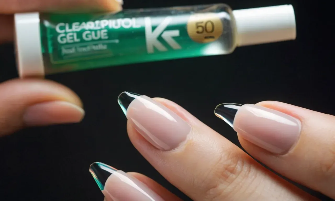 A close-up photograph captures a hand holding a tube of clear adhesive gel, showcasing alternative options to nail glue for securing artificial nails.
