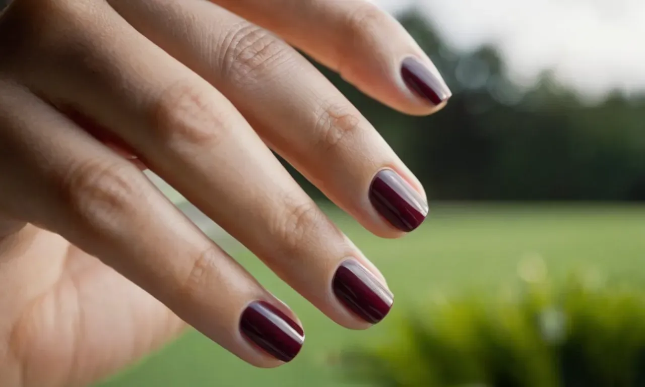 The photo showcases a close-up shot of a well-manicured hand with short, rounded nails, demonstrating a practical and ideal choice for active clients.