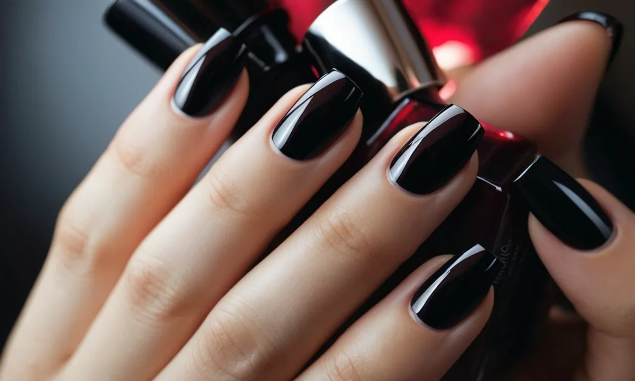 A close-up shot of elegantly manicured black nails adorned with a sleek and precise white line running along the tips, exuding sophistication and modernity.